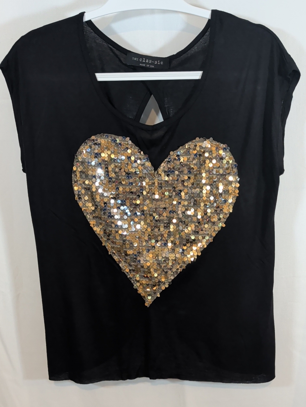 The Classic Black Tee with Gold Sequin Heart Size Is A Small Large)